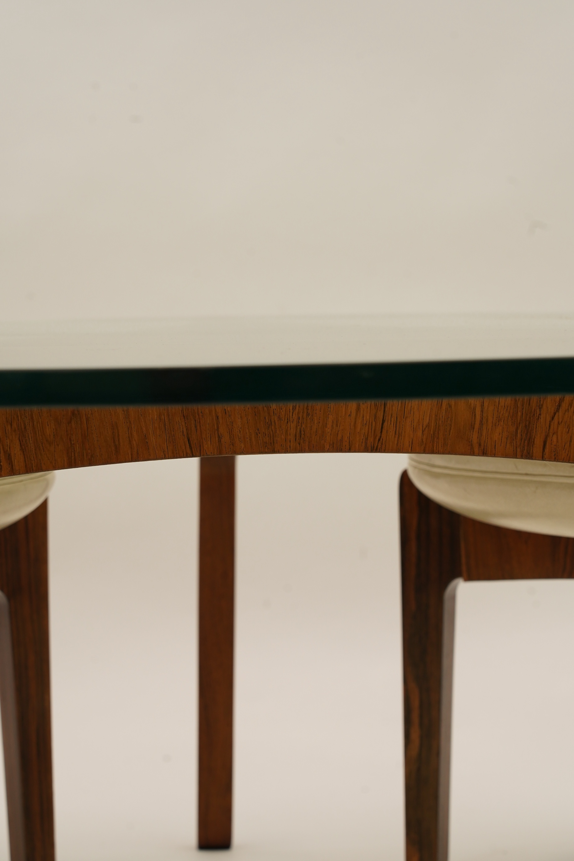 Sven Ellekaer (Danish, 1926-1984) for Christian Linneberg Møbelfabrik: A coffee table and three nesting stools ensuite